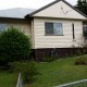 pressure washed clean weatherboard house
